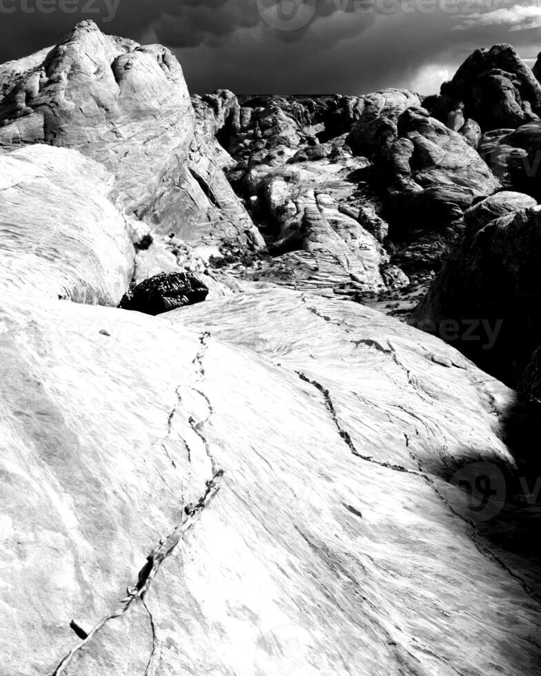 Mountains black and white photo background. High mount, rocks and hills landscape