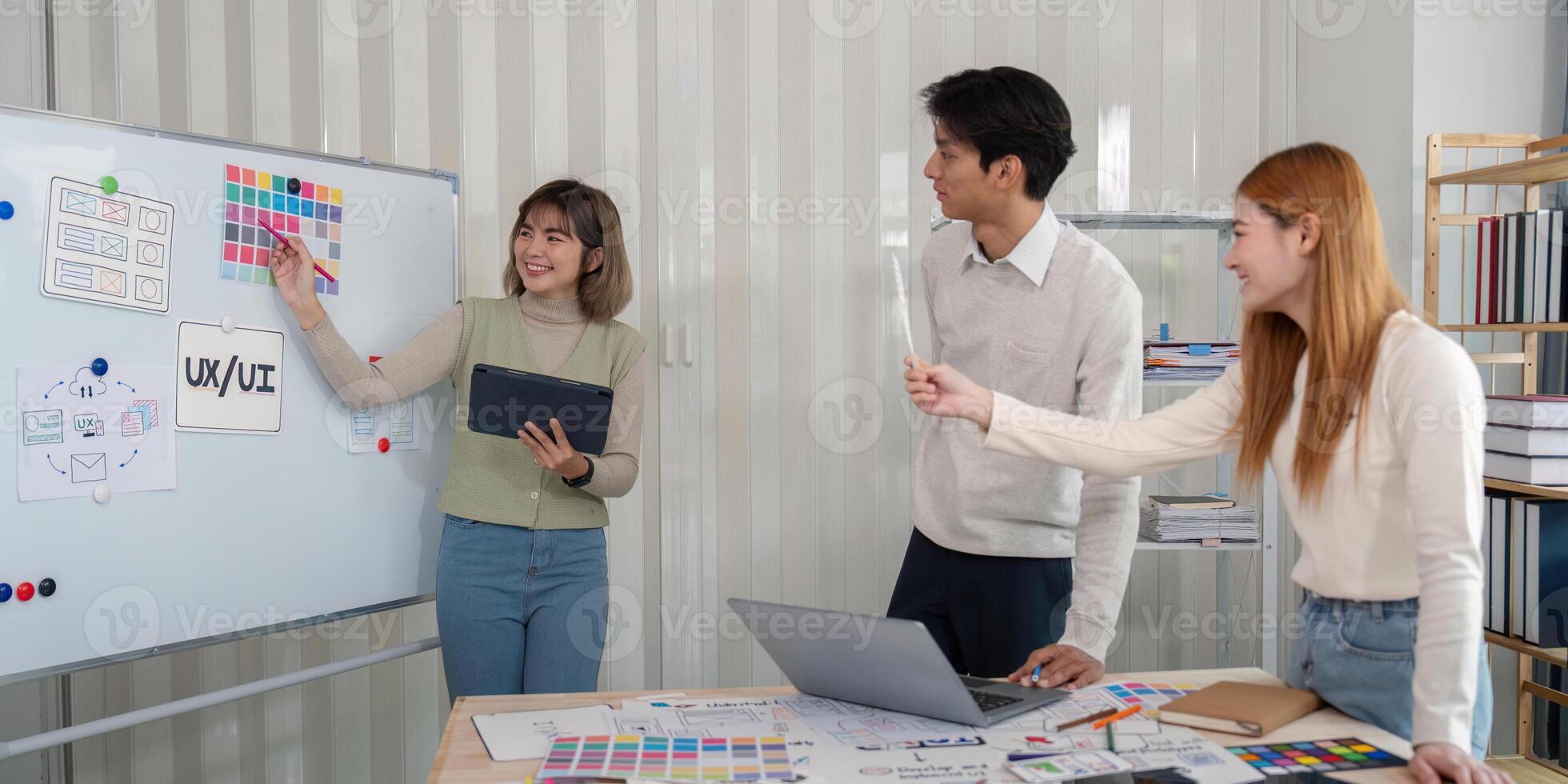 Creative UX Developer and UI Designer Brainstorming Session in Modern Office Environment photo