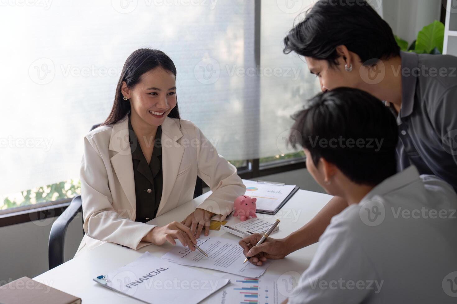Gay Couple Planning Finance with Advisor, Signing Contracts, and Investing for Future photo