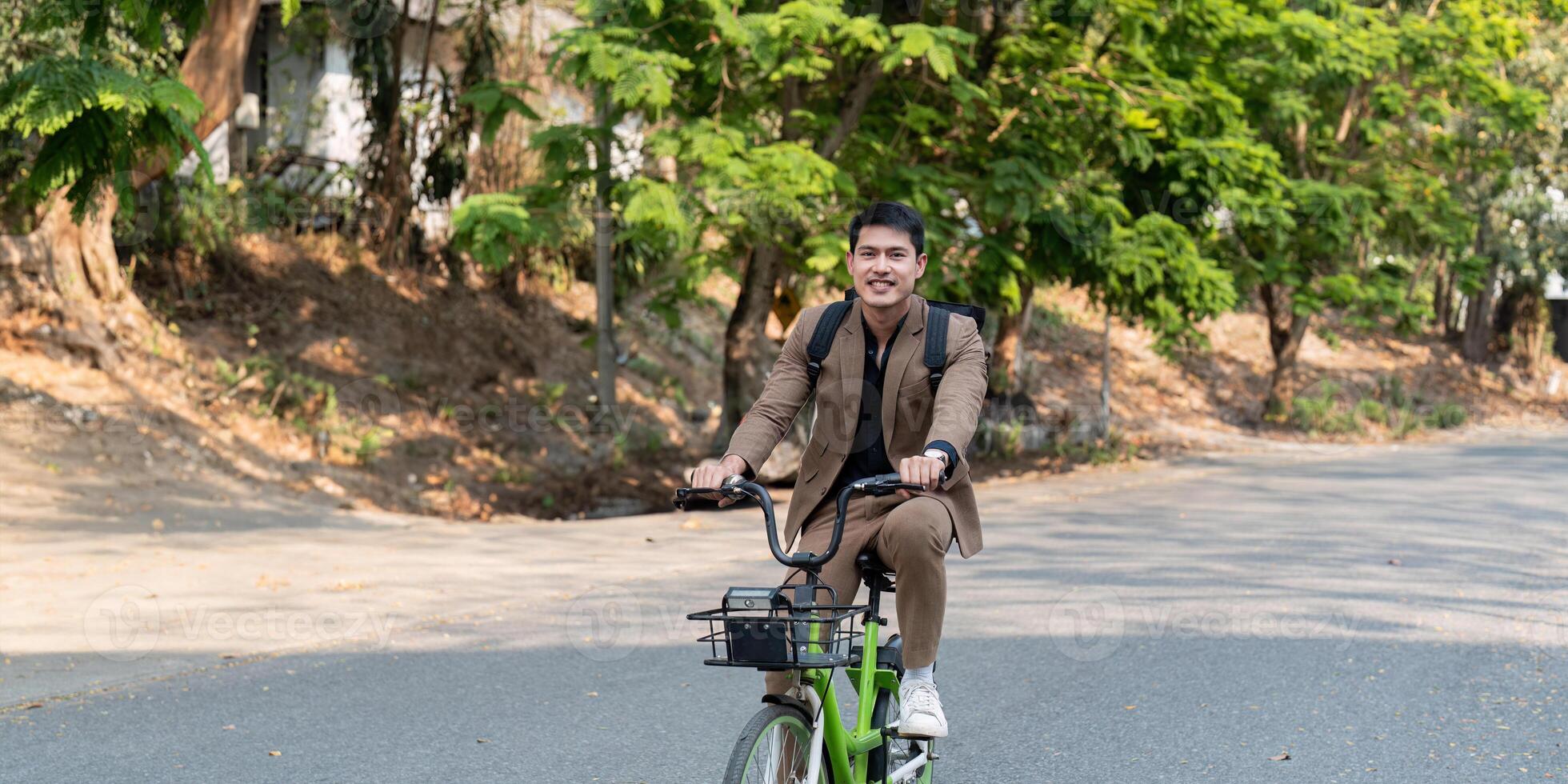 Eco Friendly Businessman Riding Bicycle to Work in Urban Setting Promoting Sustainable and Healthy Lifestyle Choices photo