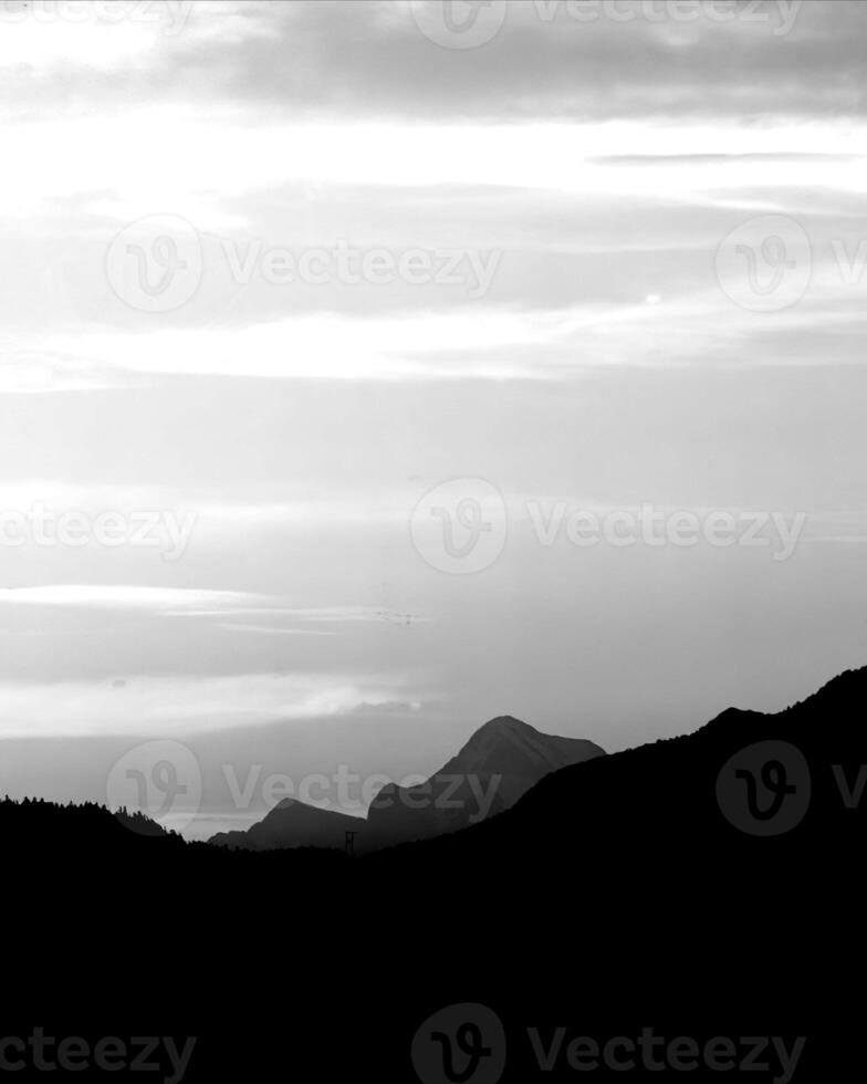 Sunset or sunrise sky black and white monochrome background photo