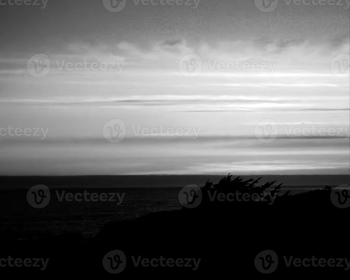 Sunset or sunrise sky black and white monochrome background photo