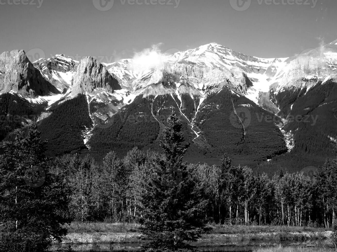 Mountains black and white photo background. High mount, rocks and hills landscape