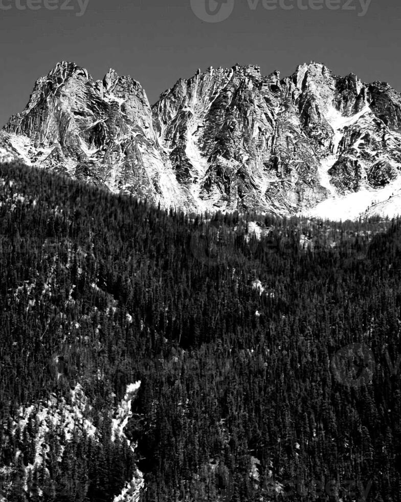 Mountains black and white photo background. High mount, rocks and hills landscape