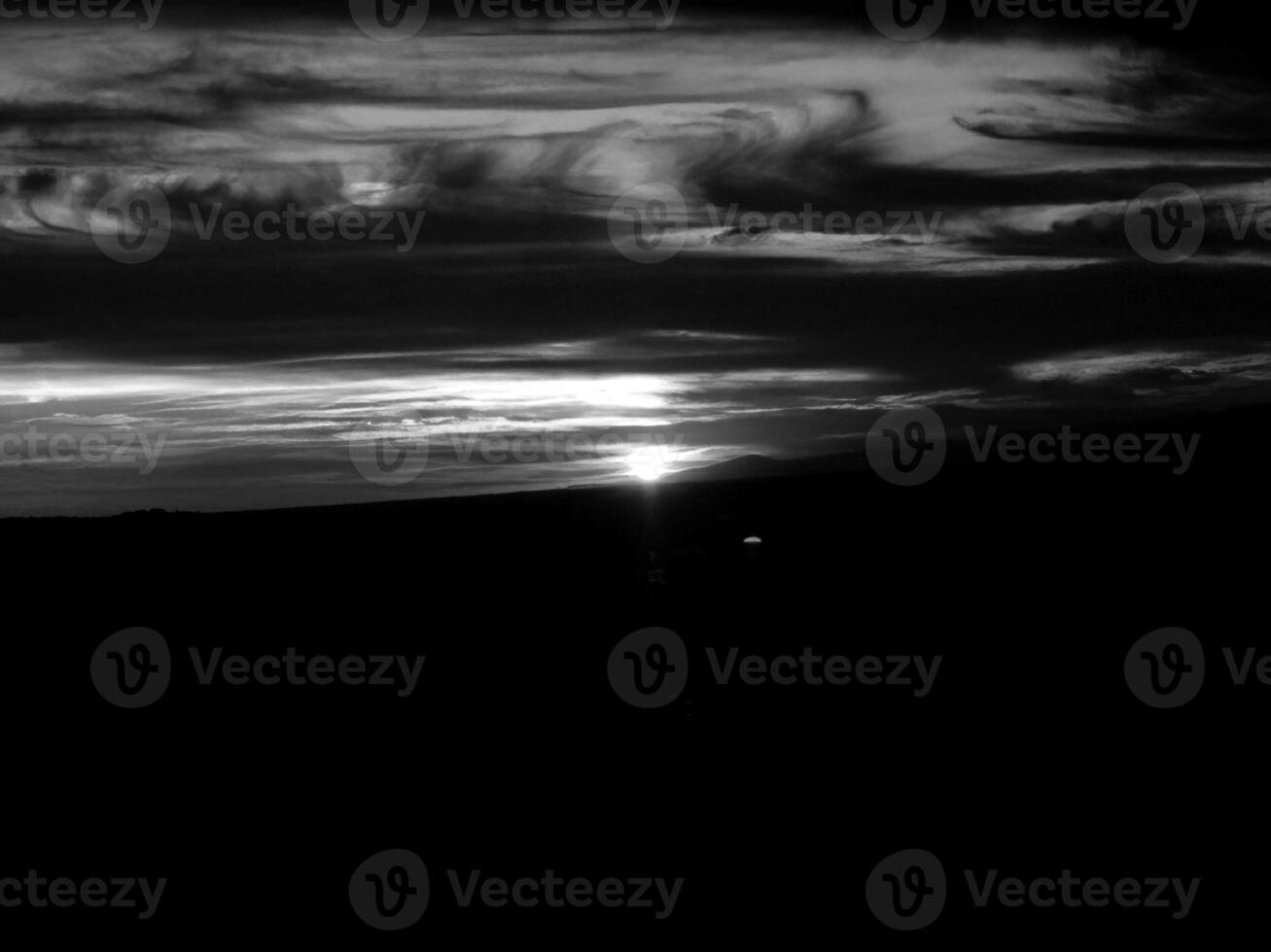Sunset or sunrise sky black and white monochrome background photo