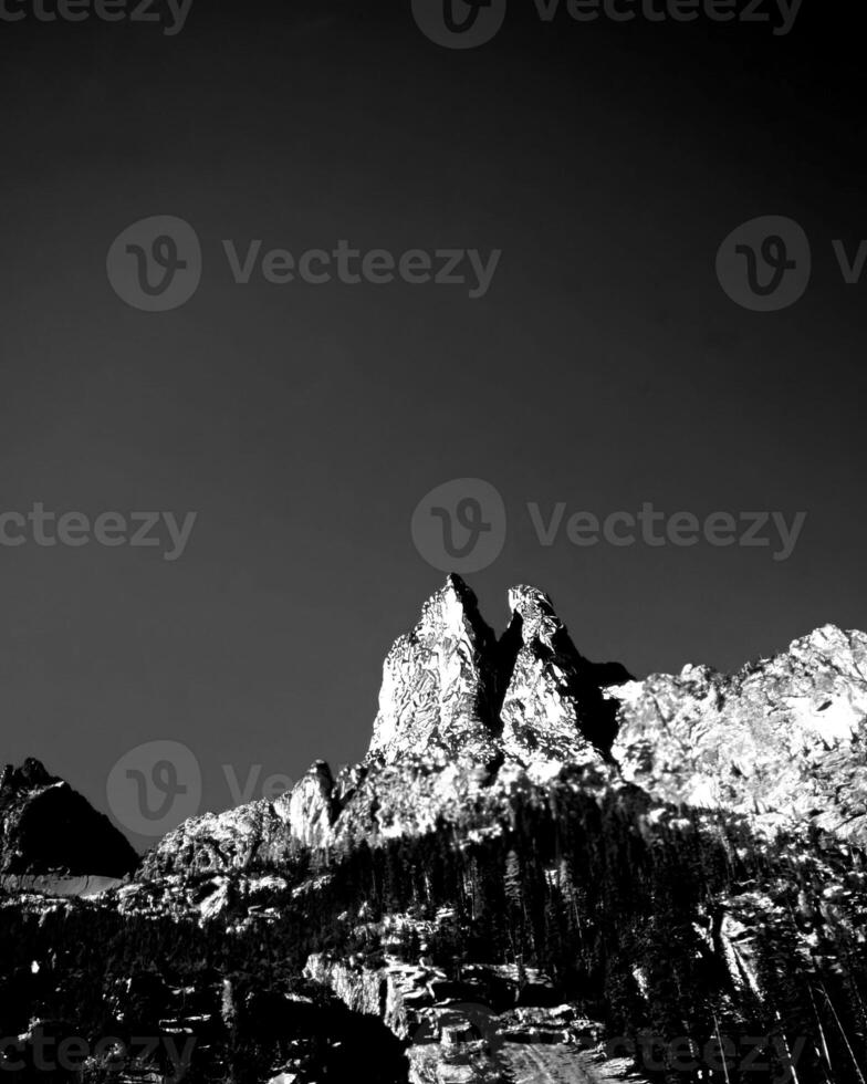 Mountains black and white photo background. High mount, rocks and hills landscape