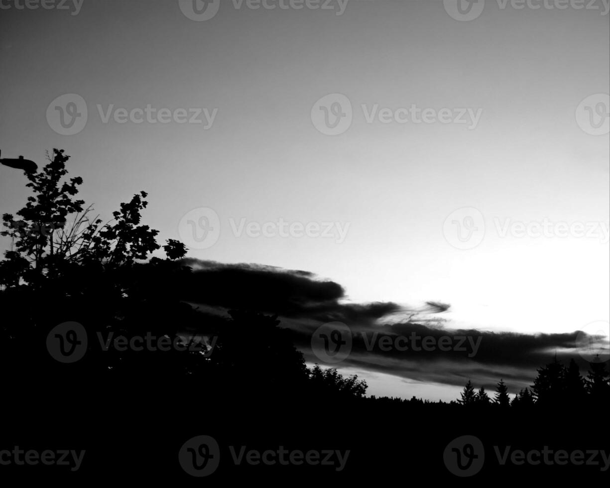 Sunset or sunrise sky black and white monochrome background photo