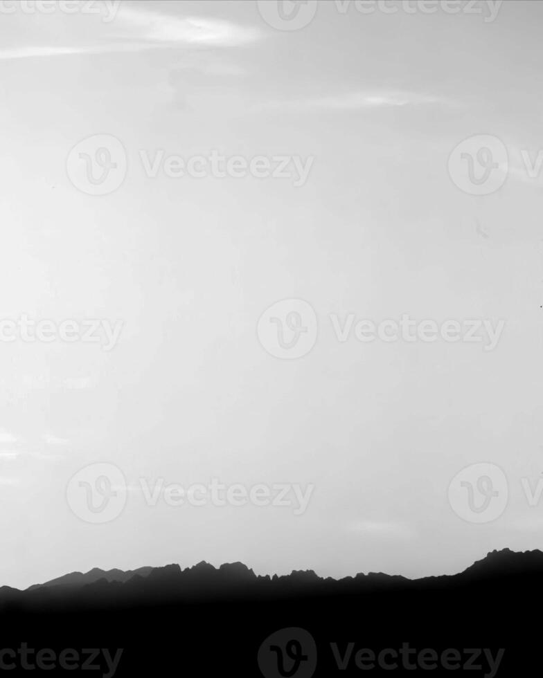 Sunset or sunrise sky black and white monochrome background photo