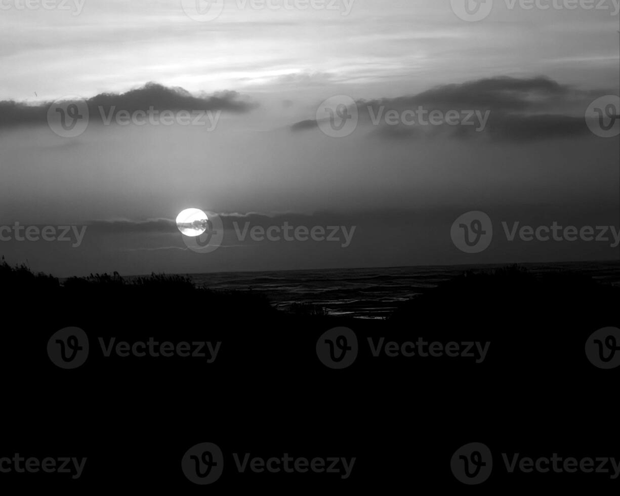 Sunset or sunrise sky black and white background photo