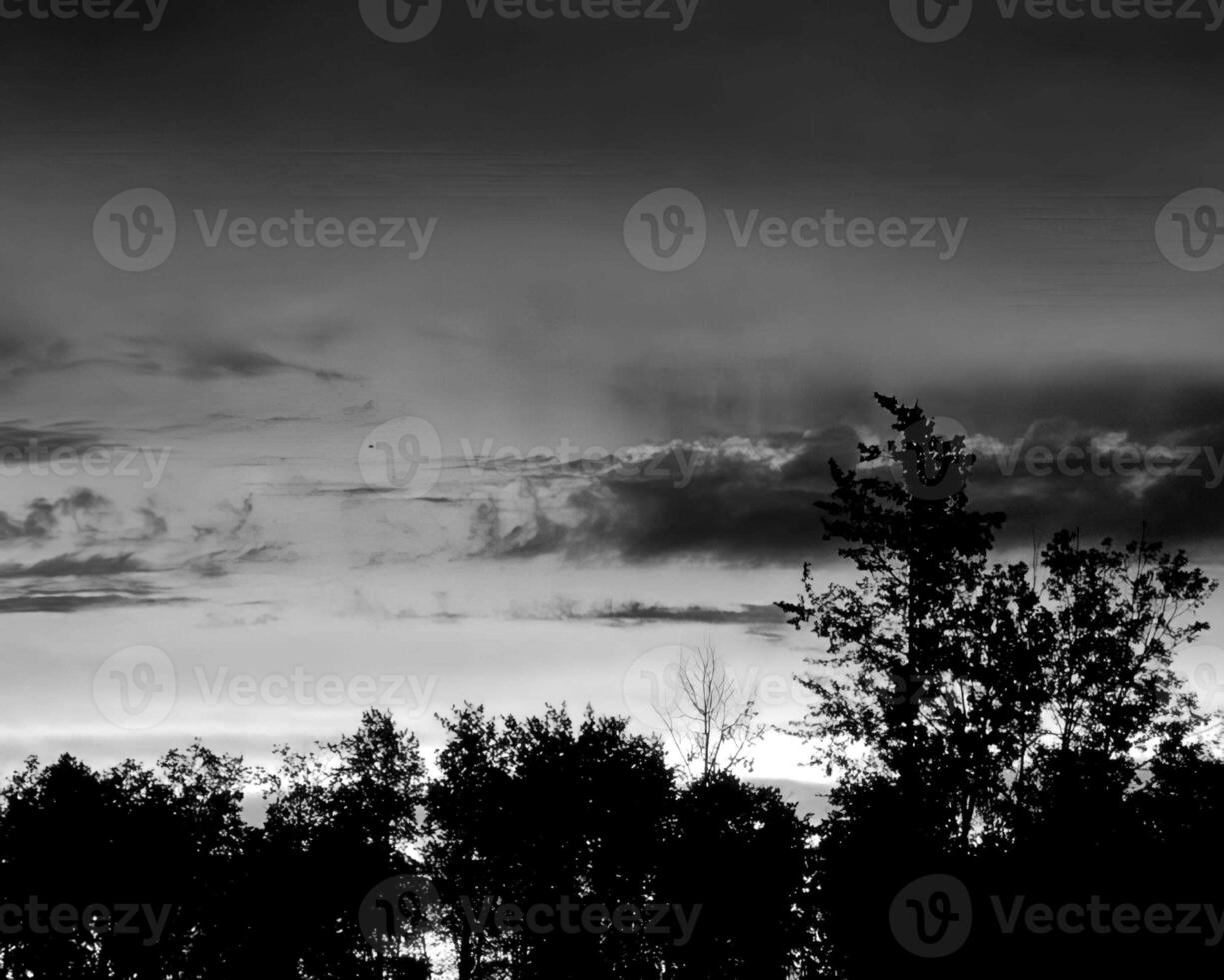 Sunset or sunrise sky black and white background photo