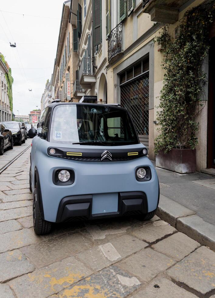 Milan, Italy, June 18, 2024 - Front view of blue Citroen Ami photo