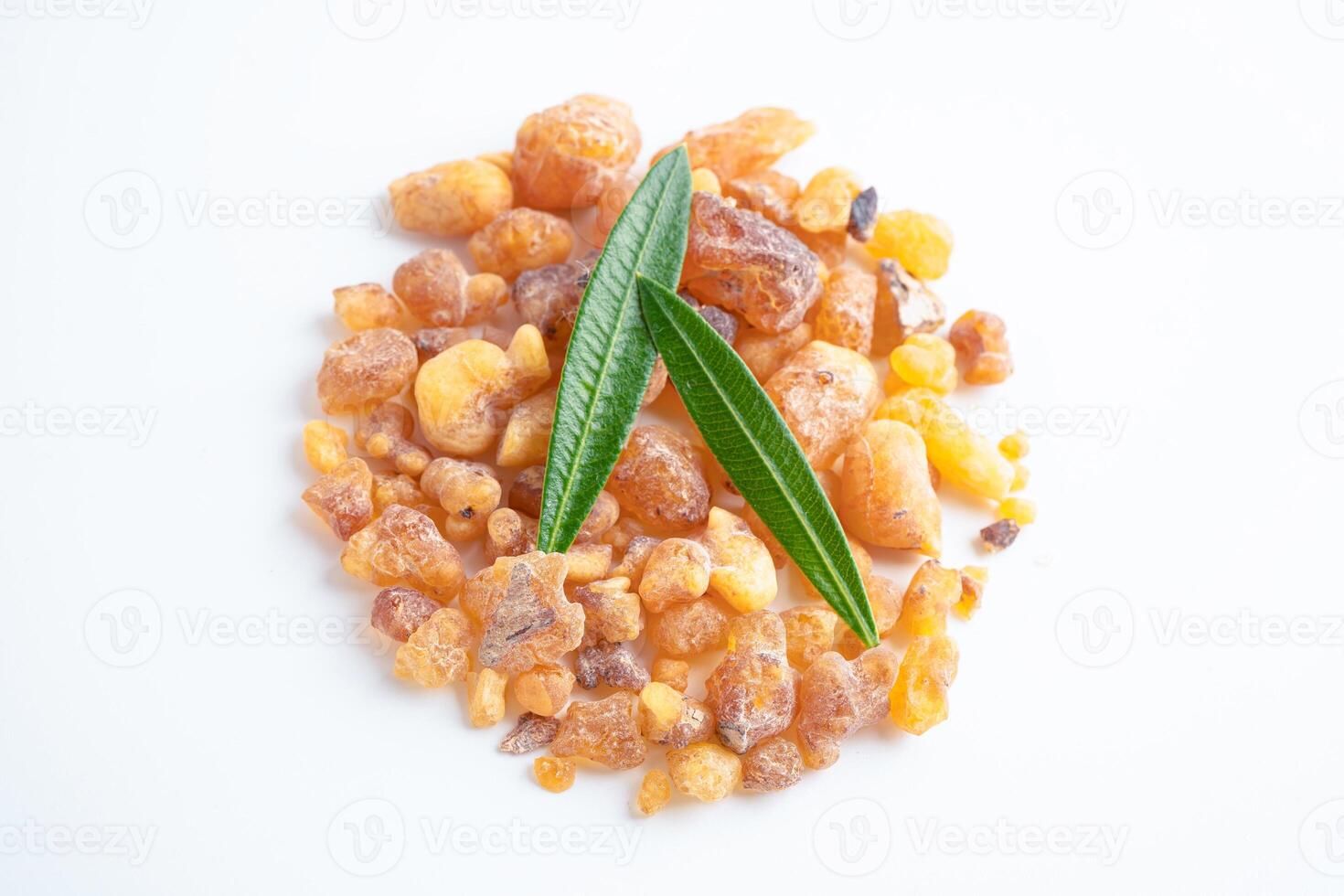 Frankincense or olibanum aromatic resin isolated on white background used in incense and perfumes. photo