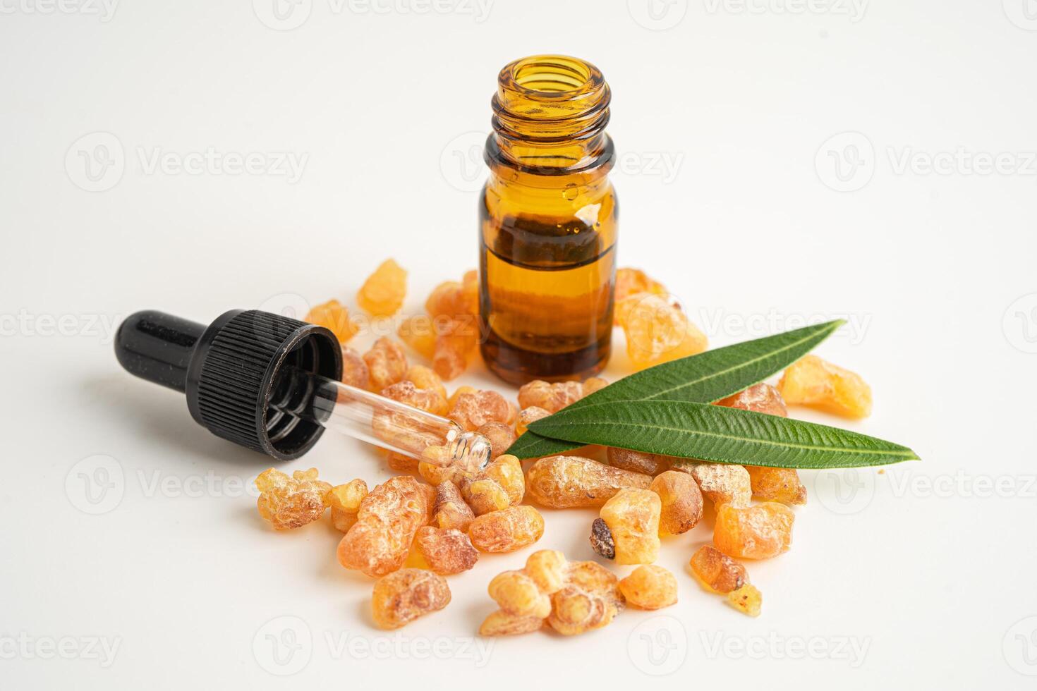 Frankincense or olibanum aromatic resin isolated on white background used in incense and perfumes. photo