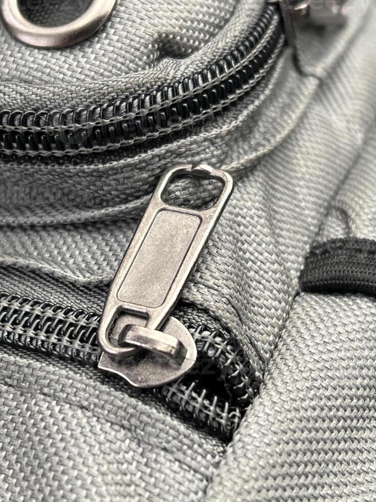 close up of a fabric bag and zipper. photo