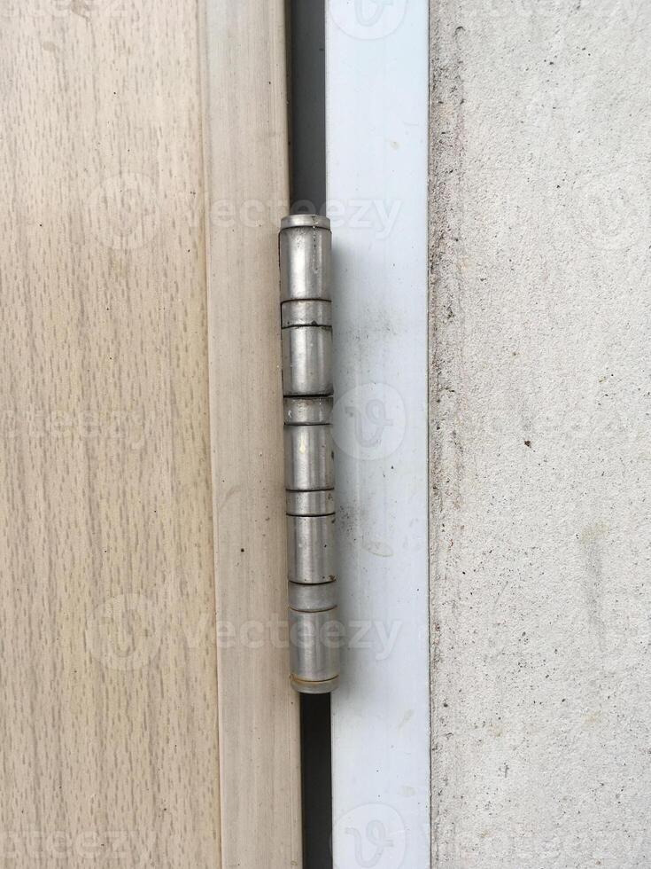 old wooden door handle , door hinge photo
