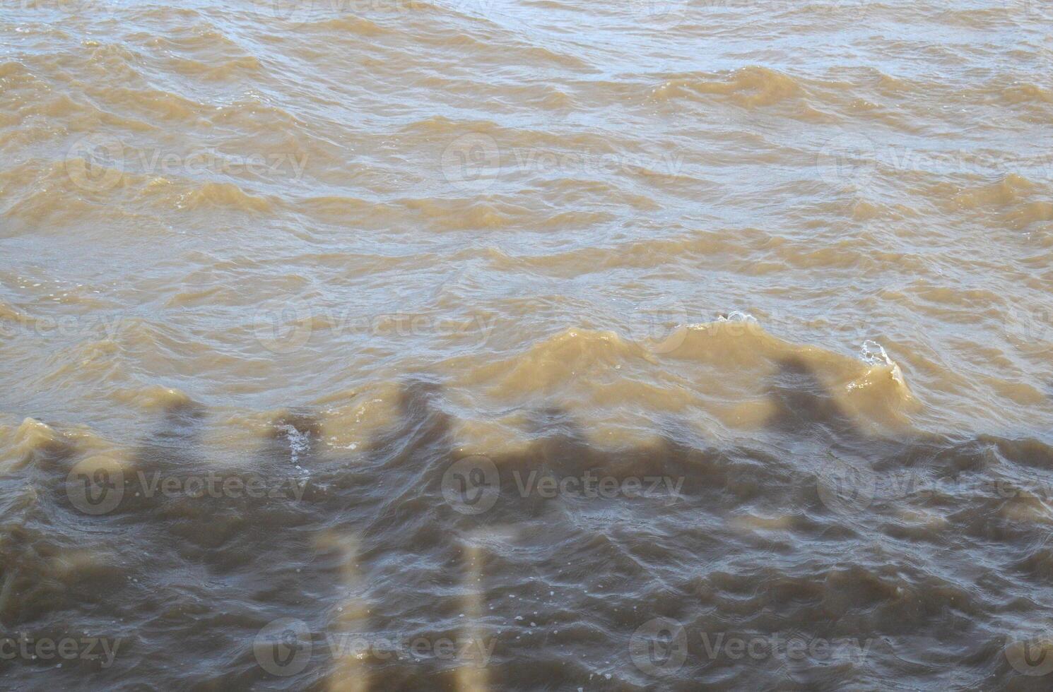 aerial view of a sea with a large wave photo