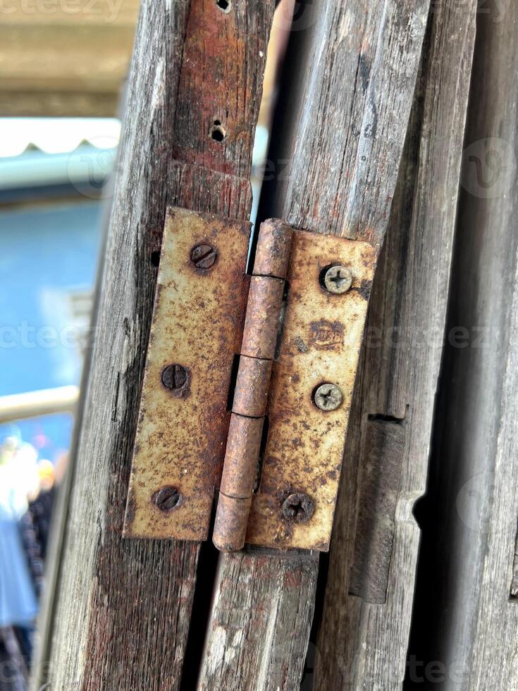 old wooden door with Hinge photo