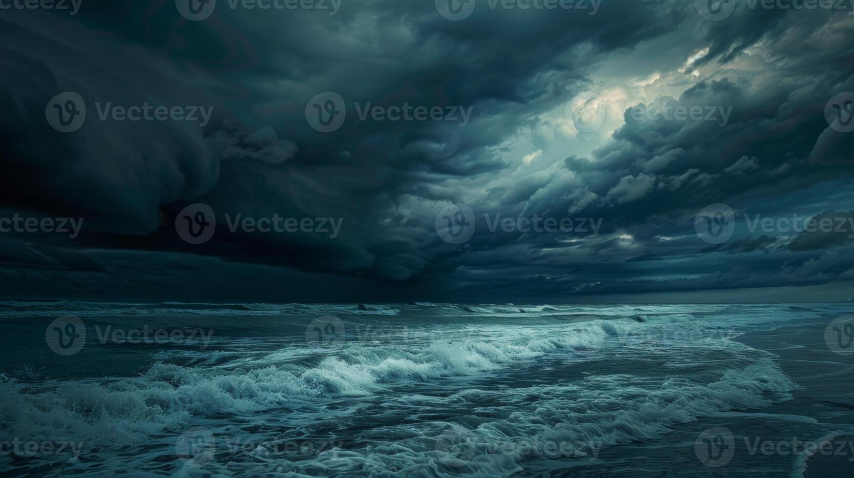 A stormy ocean with large waves crashing against the shore photo