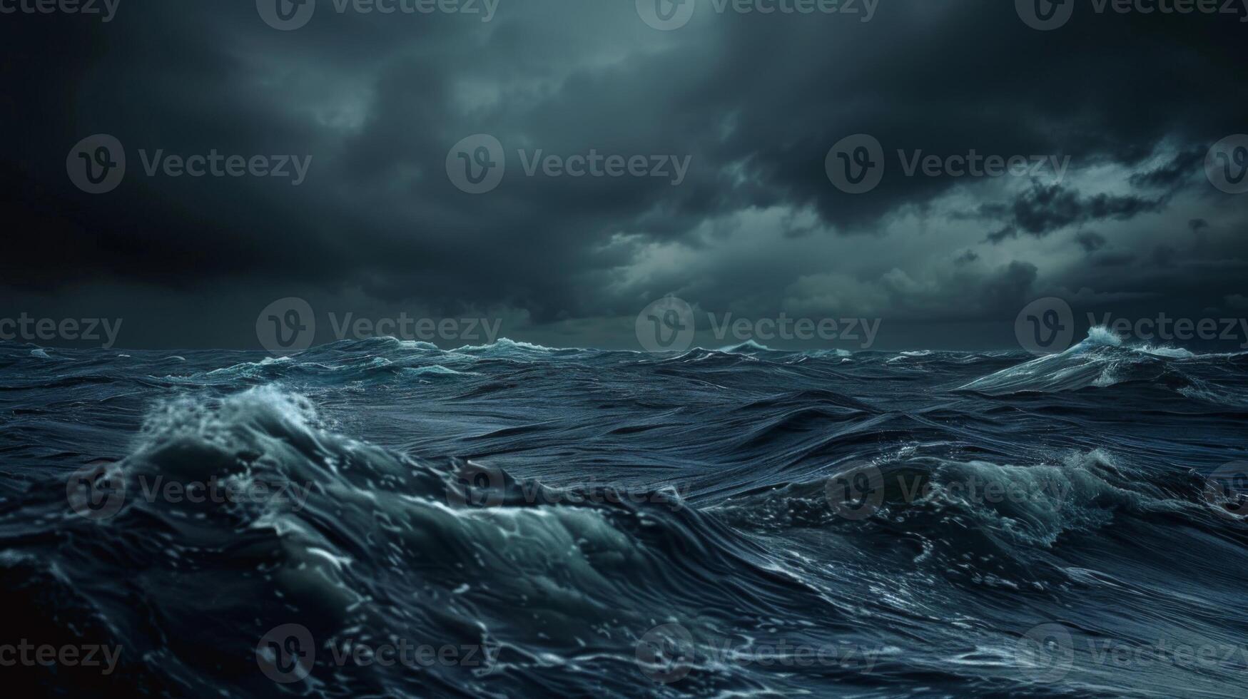 A stormy ocean with large waves crashing against the shore photo