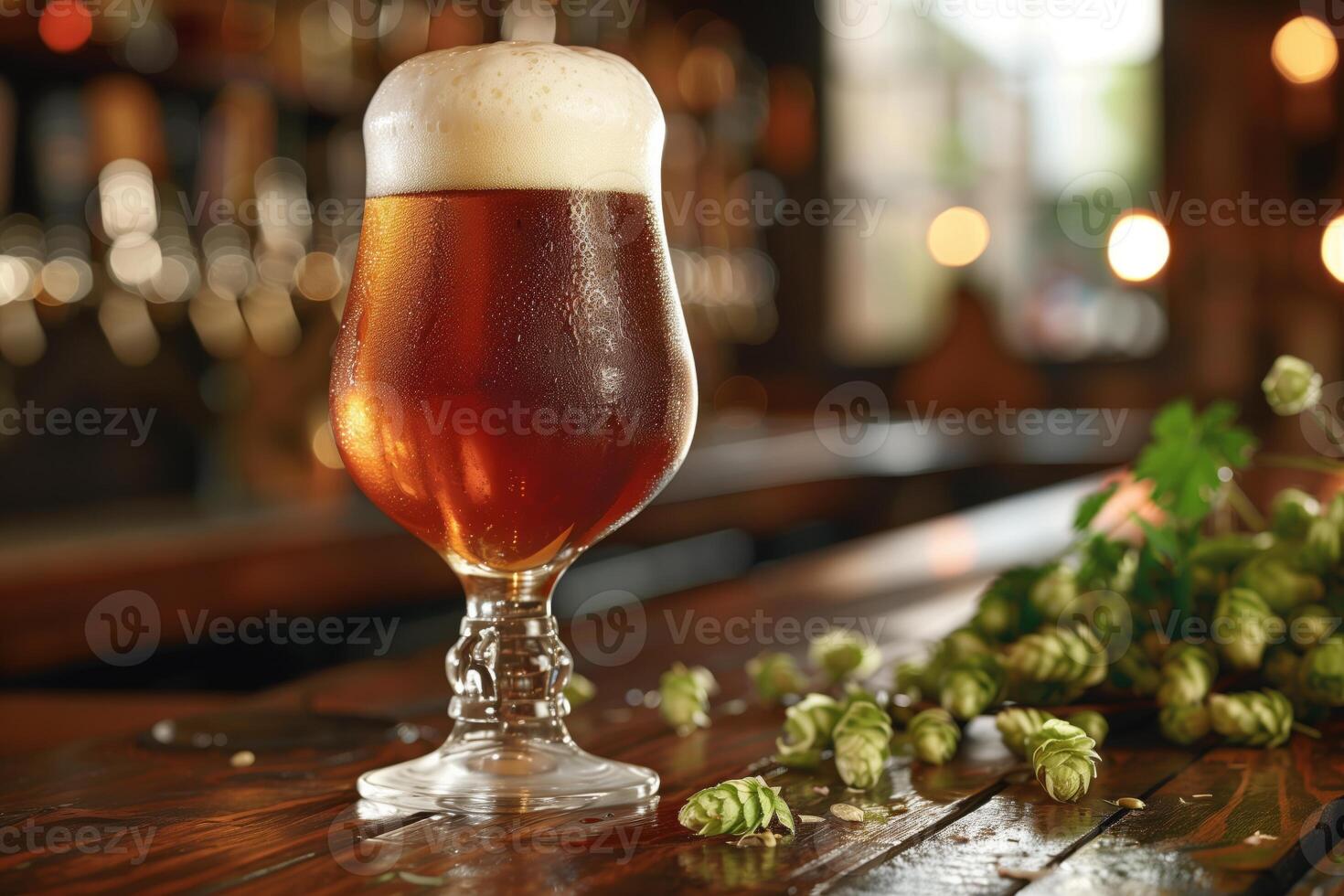Craft beer glass close-up frosty hops bar beverage brew photo