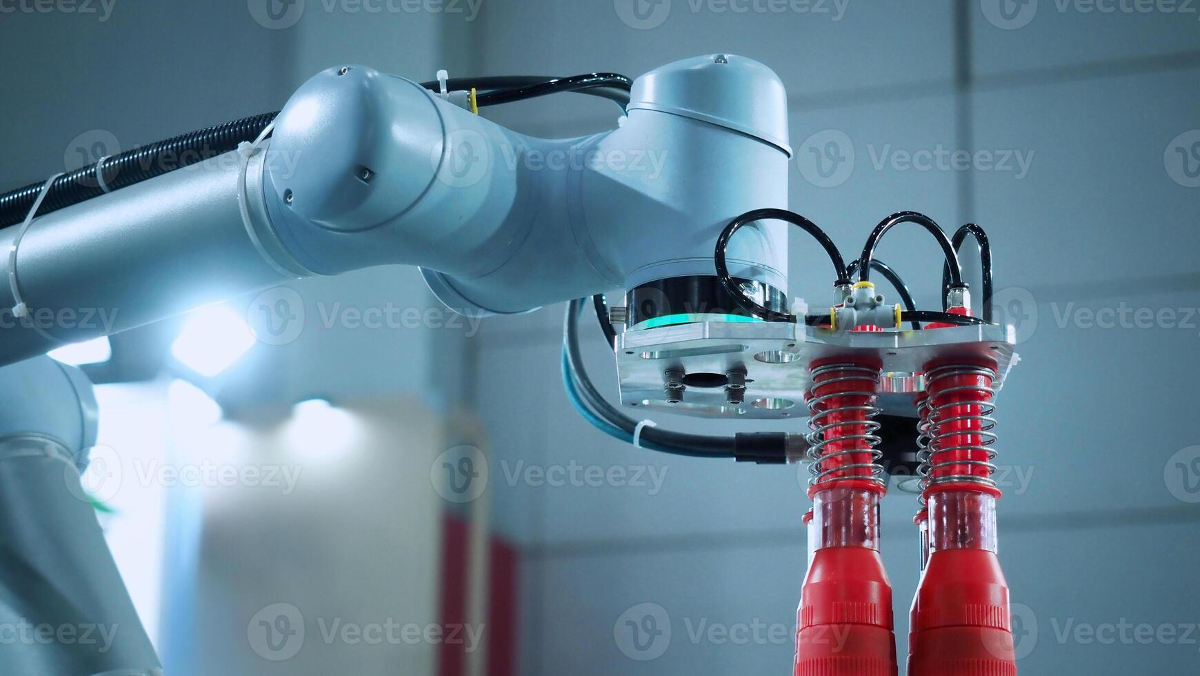 Robot arm Automation technology. Tools for saving energy effort and making the work of engineers more convenient in modern factories. Automation factory tech concept with robotic arms lifting goods. photo