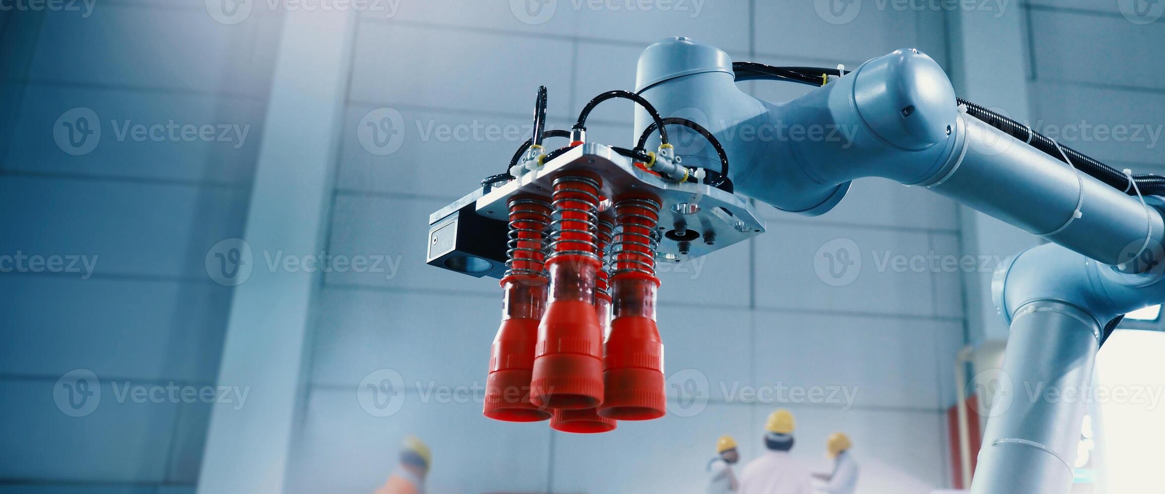 Robot arm Automation technology. Tools for saving energy effort and making the work of engineers more convenient in modern factories. Automation factory tech concept with robotic arms lifting goods. photo