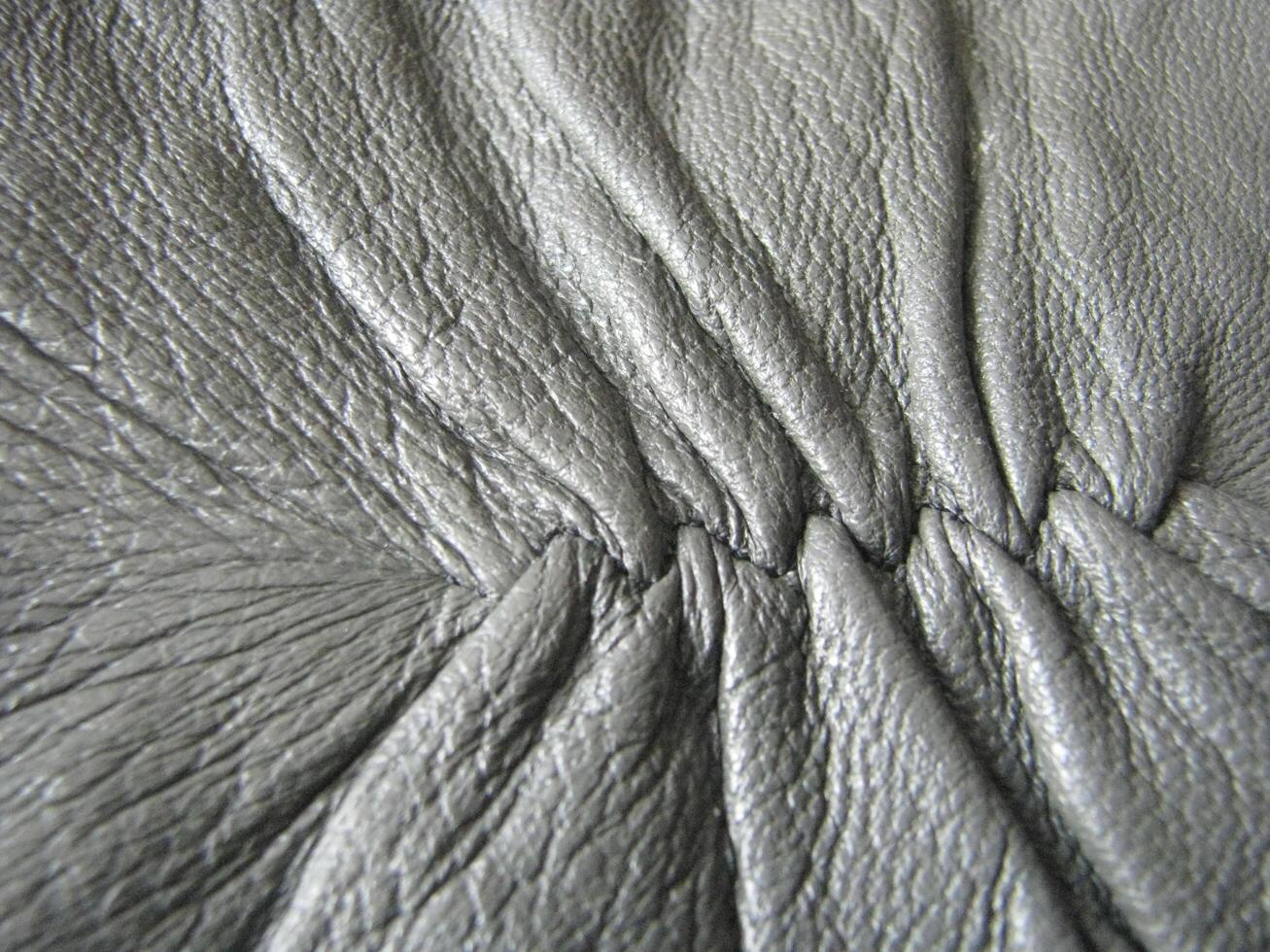 a close up of a leather bag photo