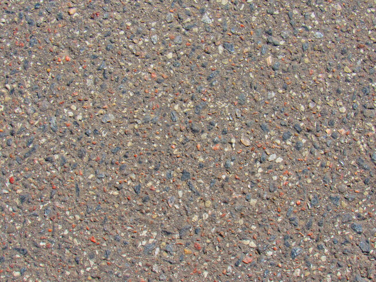 a close up of a gravel surface with small rocks photo