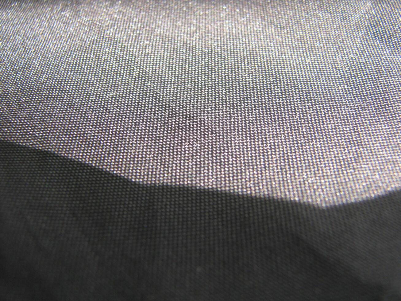 a close up of dark gray fabric photo