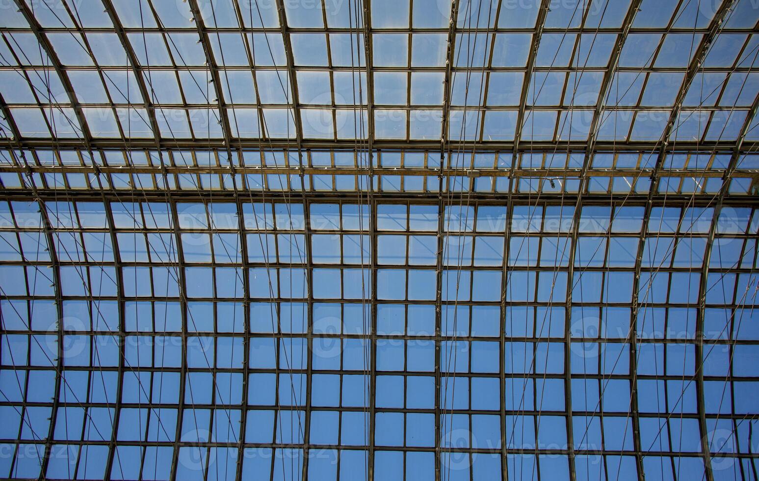 Transparent glass roof of a modern building. A shopping center on Red Square with arches and a glass roof. photo