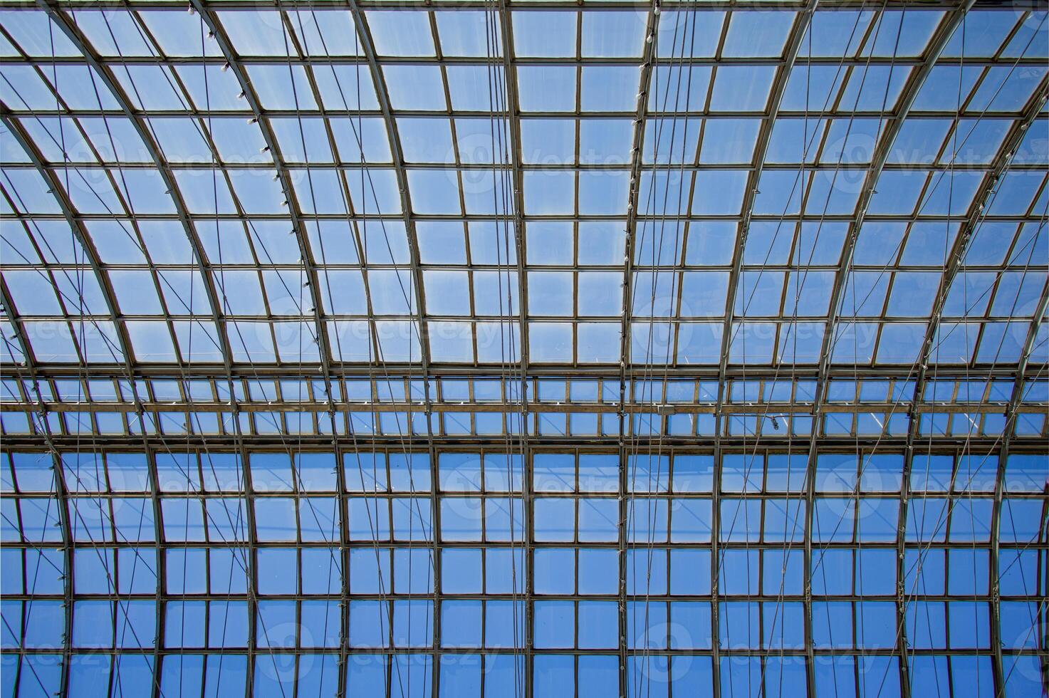 Transparent glass roof of a modern building. A shopping center on Red Square with arches and a glass roof. photo