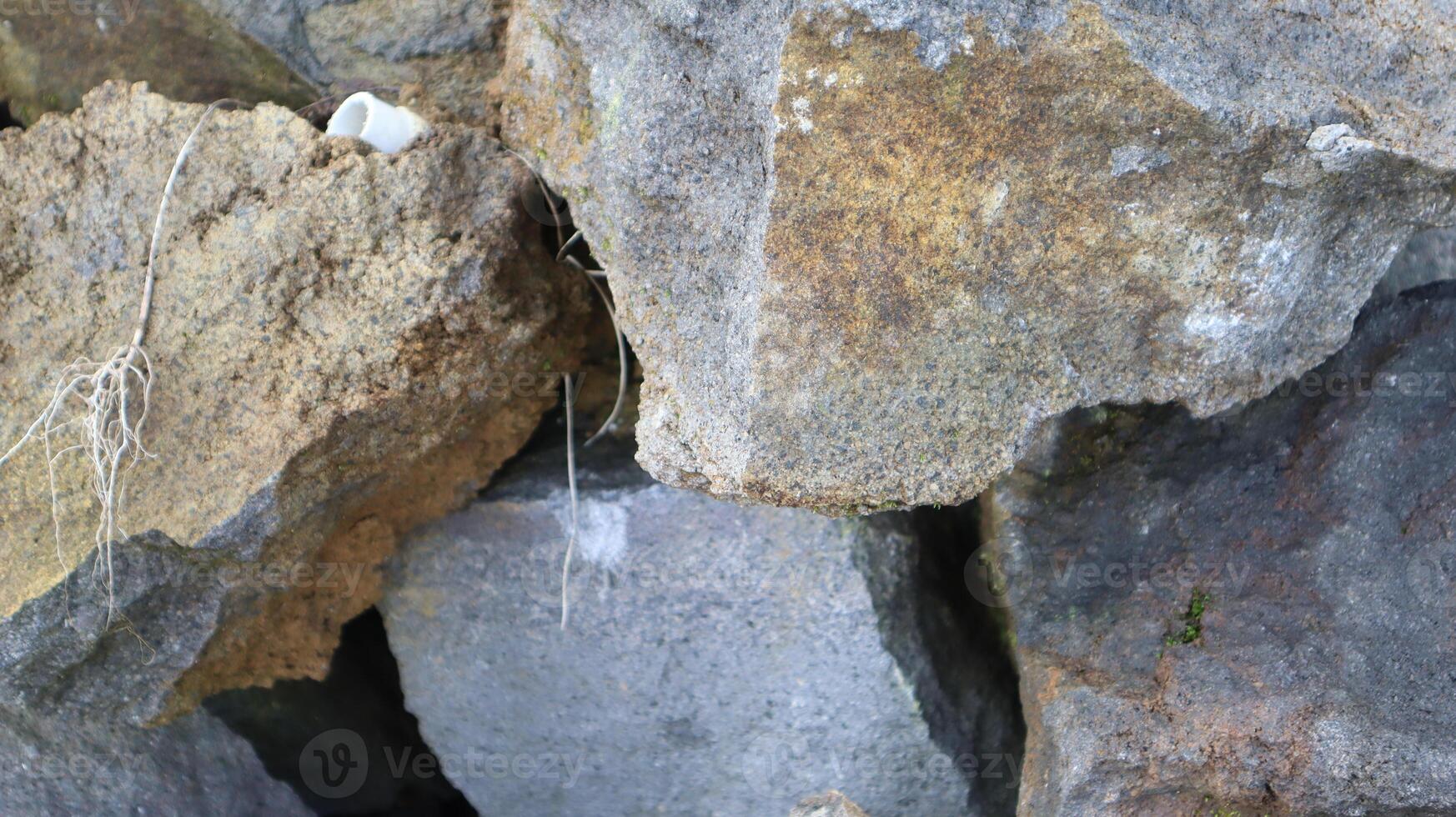 close up texture of rock fragments and soil as background photo