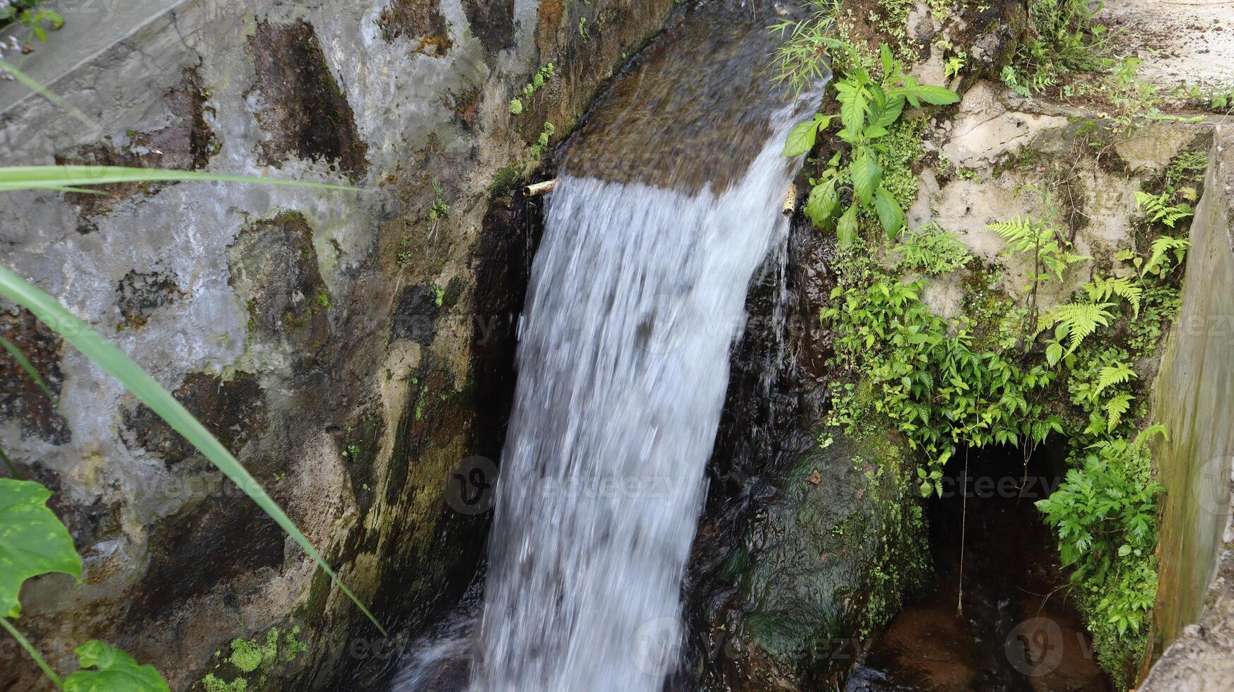 Small waterfall, waterfall. Natural. Water in motion photo