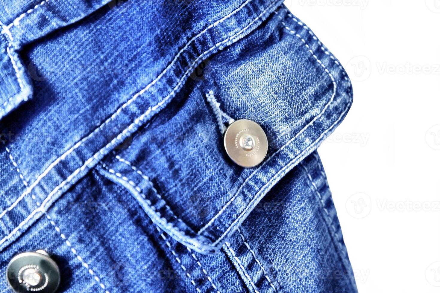 Jeans jacket close-up on white background photo