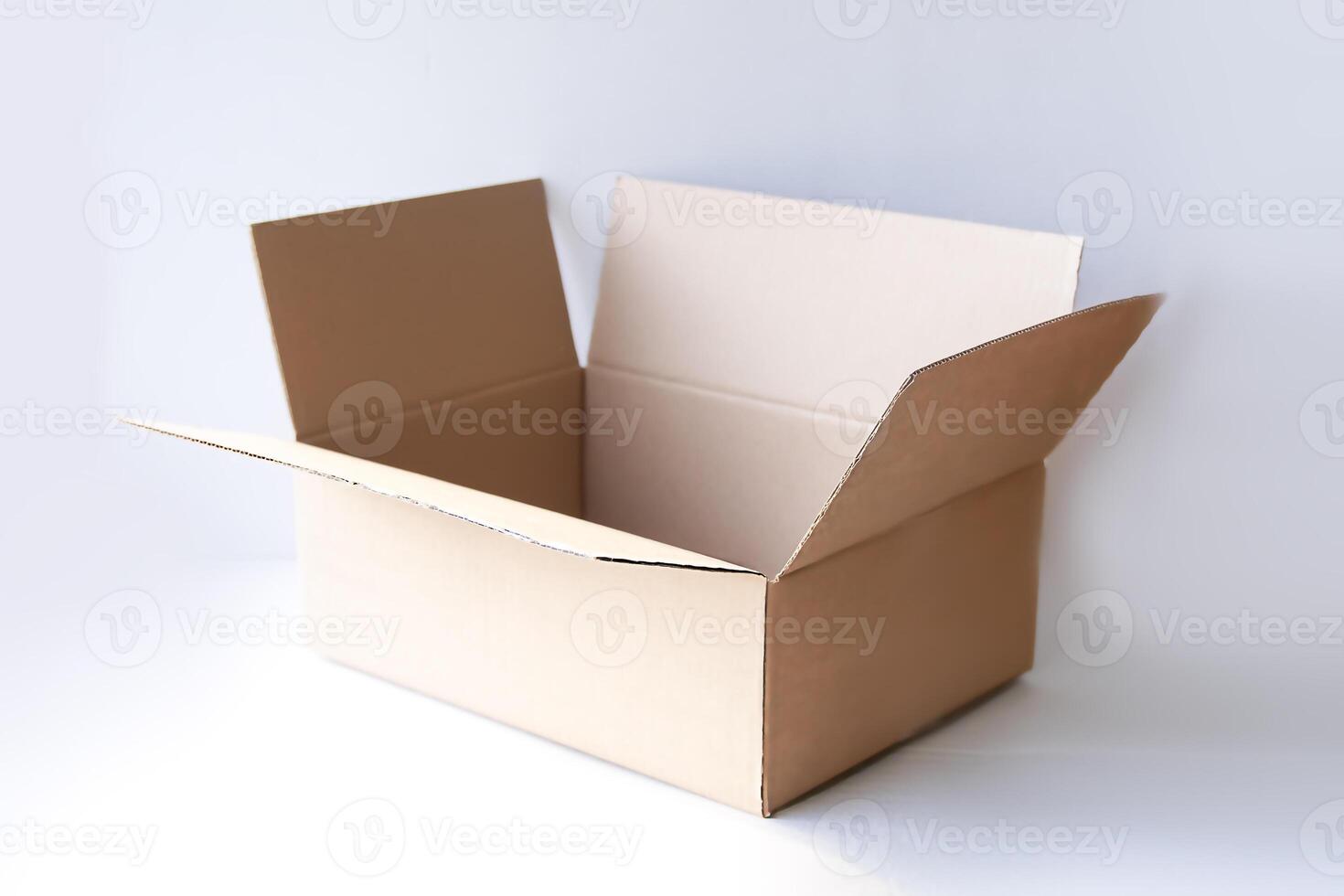 Empty cardboard box on white background photo