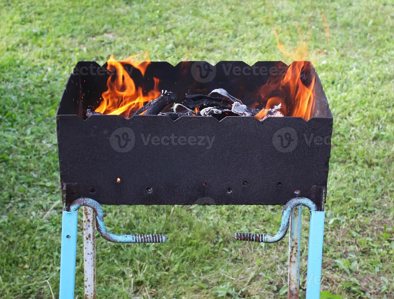 Burning fire outdoors photo