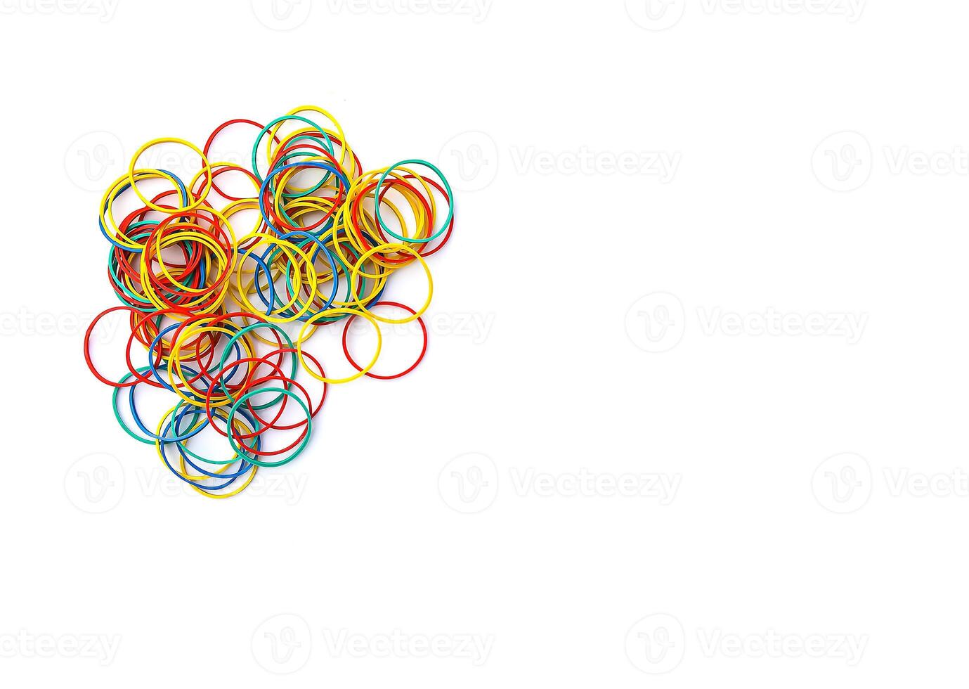 Colorful rubber bands on white background photo
