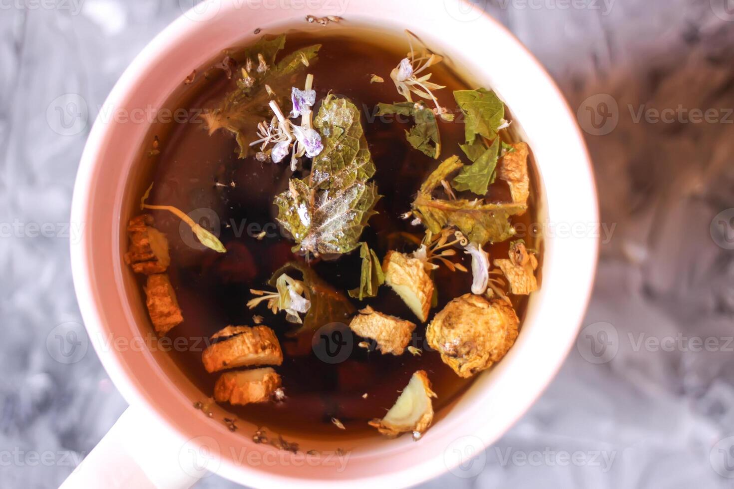 Herbal tea in ceramics cup. photo
