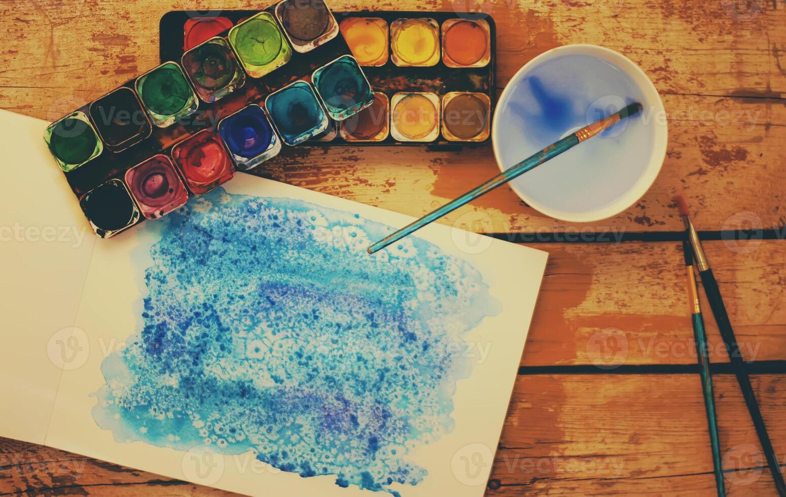 Watercolor painting with supplies photo