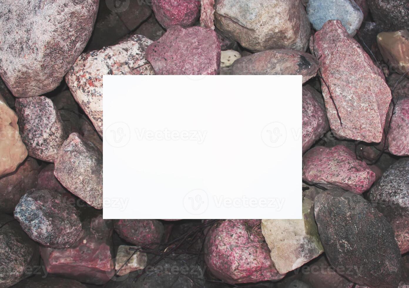 White paper sheet on stone wall photo