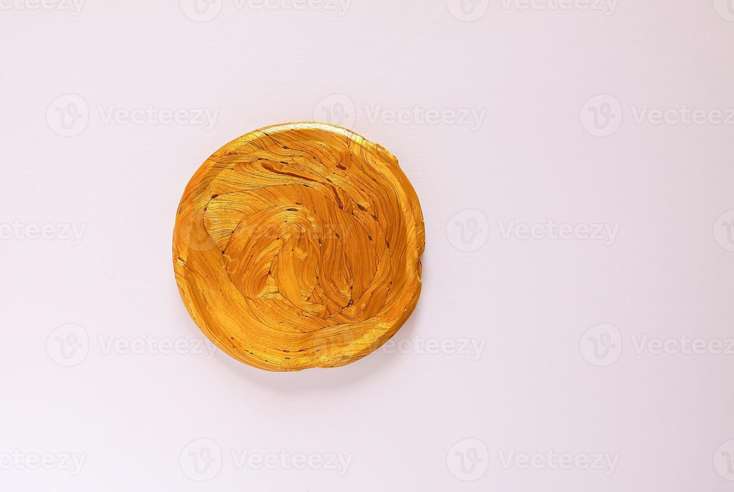 The pasticine texture. Golden mass for kids activity, toys, handmade, anti-stress. photo