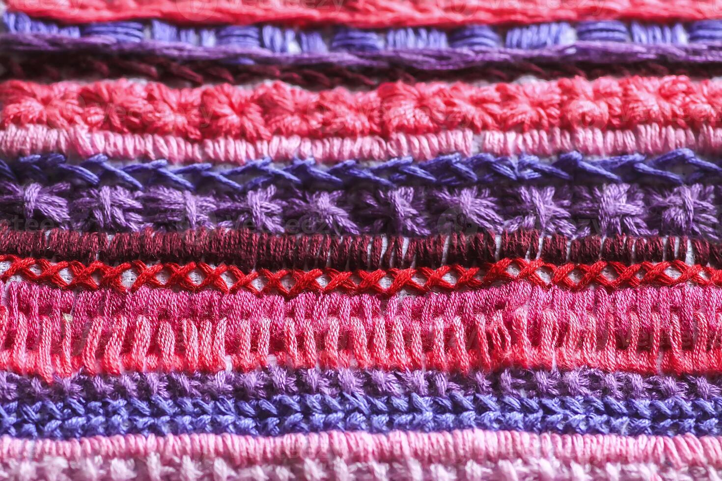Embroidery on canvas close up photo