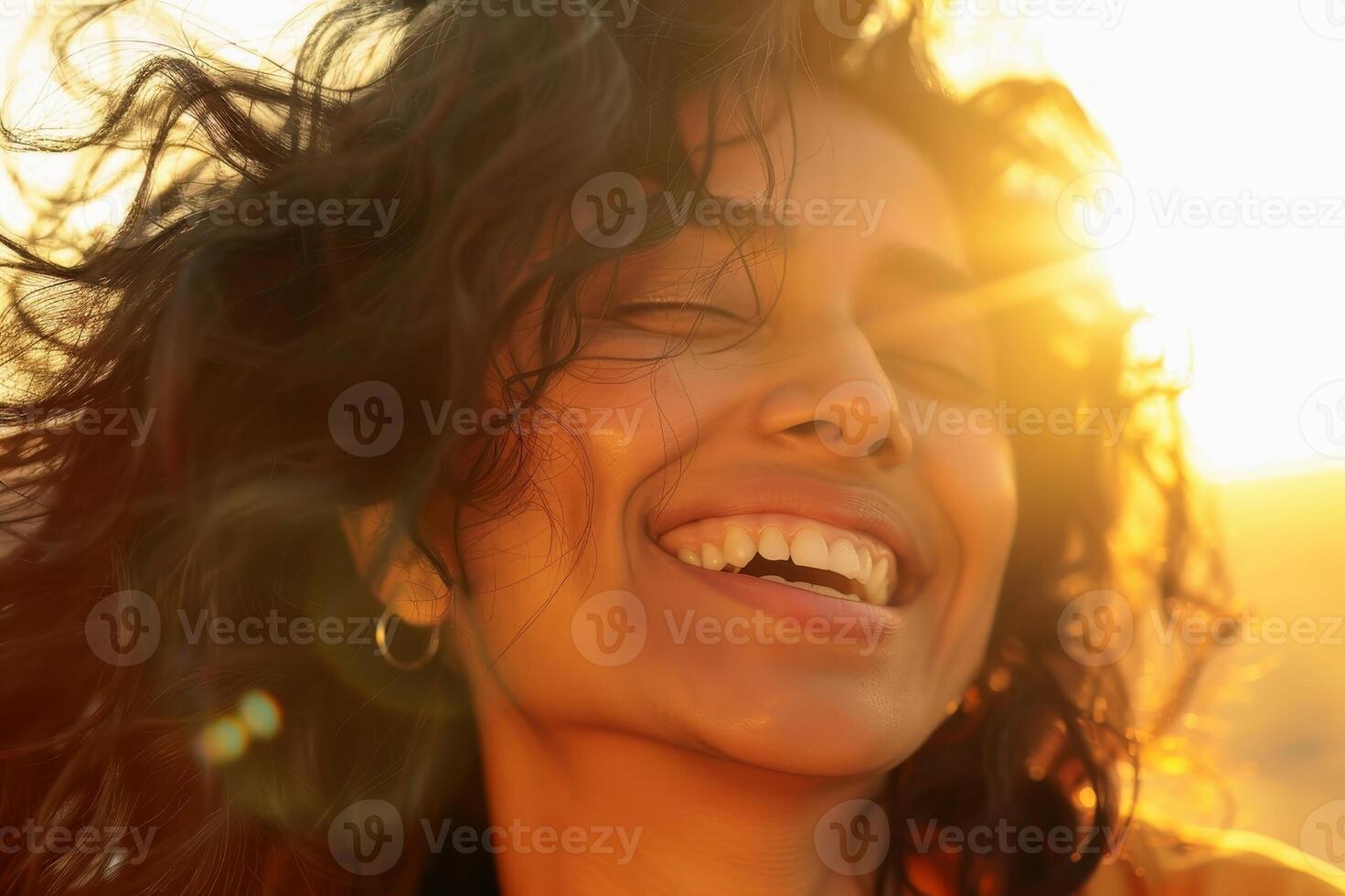 A South Asian woman laughing with her eyes closed, sunlight filtering through her hair and casting a warm glow on her face. AI generate photo