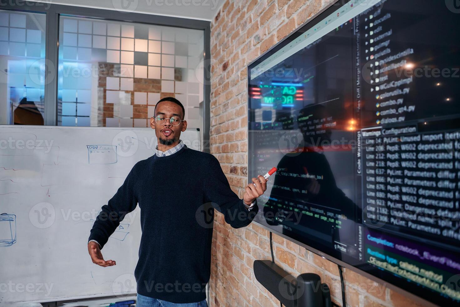 African American businessman delivers a compelling presentation of his business strategy to his colleagues, fostering collaboration and forward thinking photo