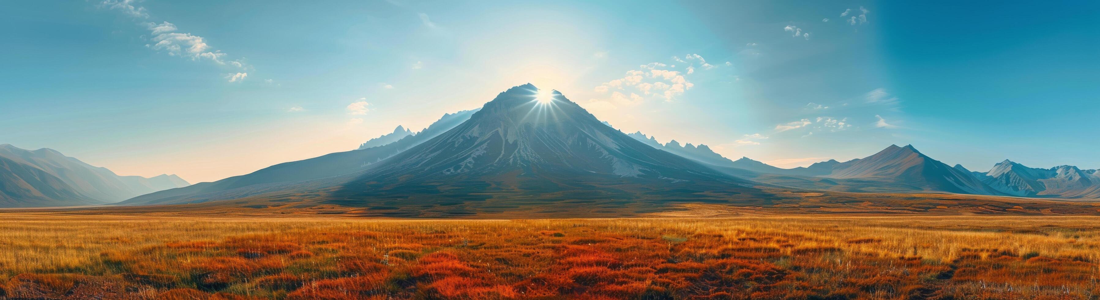 Sunlit Mountain Range in Early Morning Light photo