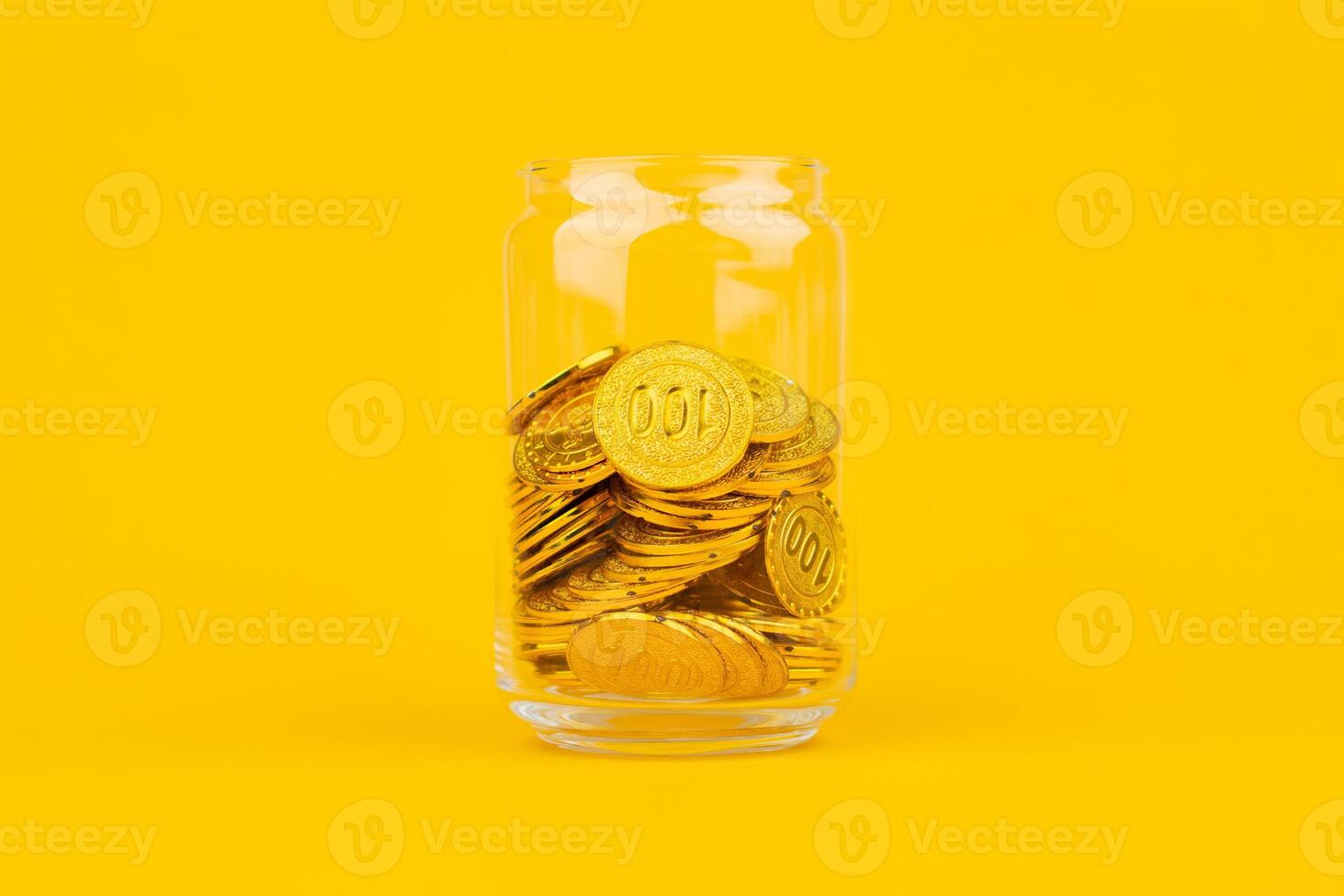 Gold coins on a yellow background, investing in gold Stock market and financial growth photo