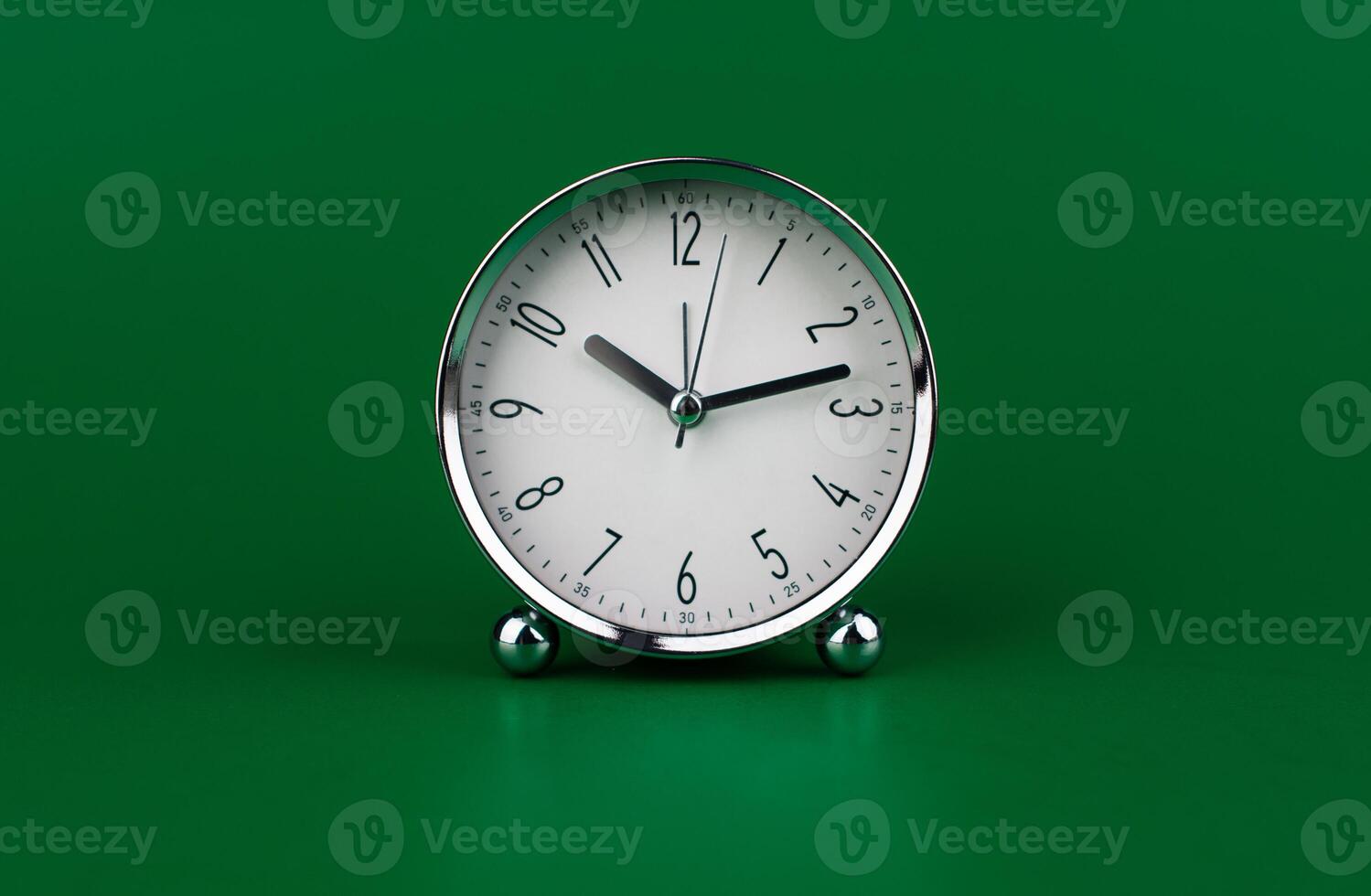 Stopping alarm clock, time concept and working with time and planning work with limited time photo