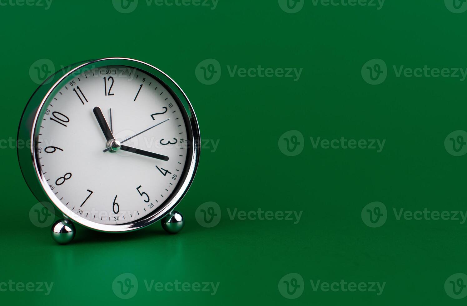 Stopping alarm clock, time concept and working with time and planning work with limited time photo