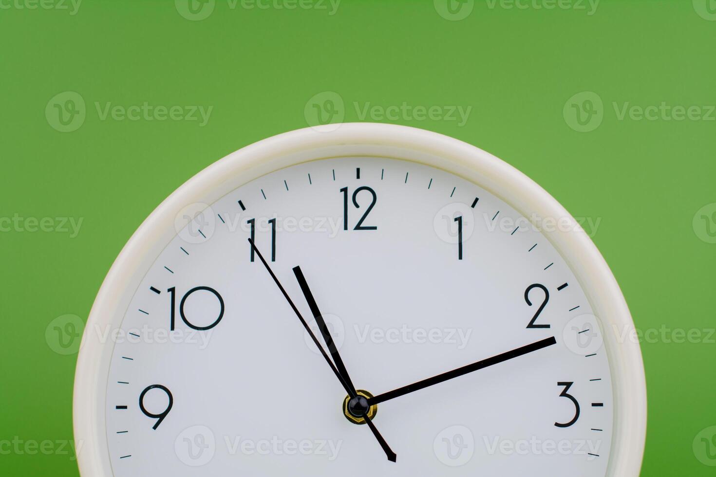 Time and the law of time, the limits of work, a stationary hand, studio photography, time concept. photo