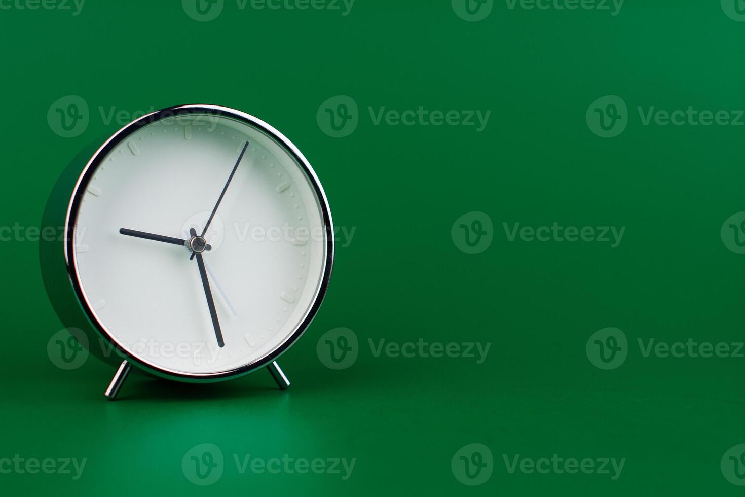Stopping alarm clock, time concept and working with time and planning work with limited time photo